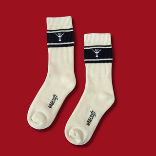 Weihnachtsgeschenk für Weinliebhaber: Stylische Weinsocken mit Korkenzieher-Motiv von Winecraft